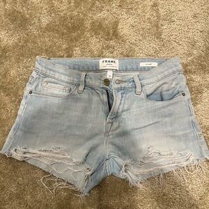 Frame Distressed Shorts in Light Blue